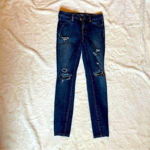 American Eagle high rise jeggings distressed dark blue jeans